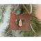 Photo of Copper I Love Oregon Ornament with Heart shape cutout in the middle and an Oregon Sunstone gemstone hanging inside the heart cutout